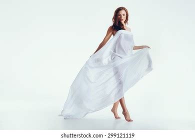 Sensuous Naked Woman Holding Sheer Cloth Stock Photo