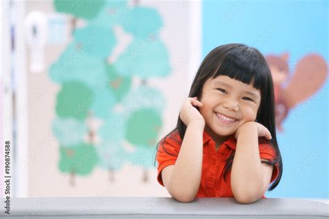 Asian Children Cute Or Kid Girl Happy Fun And Smile With Wear Red Shirt