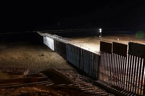 Video Shows Migrants Climbing Over Border Fence In Tijuana In Broad