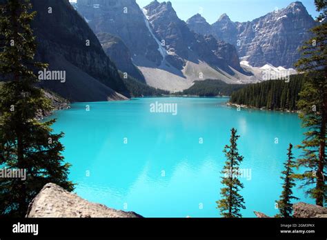 Focus On The Turquoise Water Of Moraine Lake In Banff National Park In