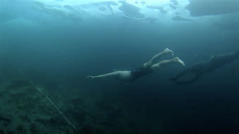 Breaking The Ice Russian Chill Seeker Dives Into Freezing Waters Of