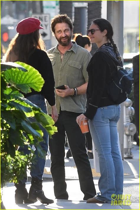 Gerard Butler Shares A Laugh With Fans While Arriving At Lunch Photo