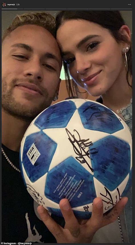 Neymar Poses With His Girlfriend And The Champions League Match Ball