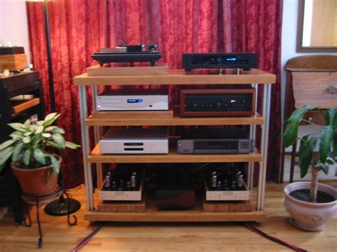Industrial design audio rack made out of blockboard and large size threaded rods and nuts. Anyone have good plans for a DIY audio rack? | 80/20 Aluminum T Rails | Pinterest | Audio and Walls