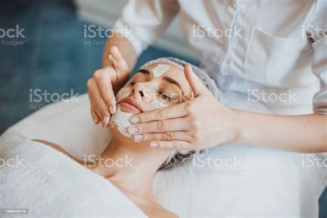 Beautiful Woman Receiving Facial Massage And Spa Treatment At Beauty Stock Image Everypixel