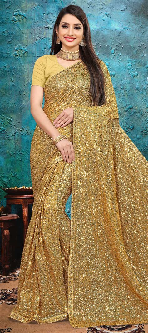 festive party wear gold color georgette fabric saree 1691982