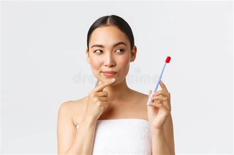 Beauty Personal Care And Hygiene Concept Close Up Of Thoughtful And Cunning Attractive Asian