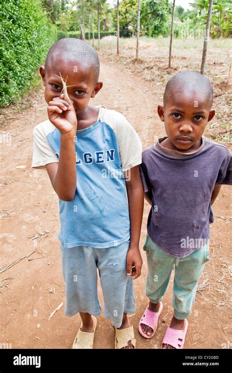 Two African Children Playing On The Street In Moshitanzaniaeast