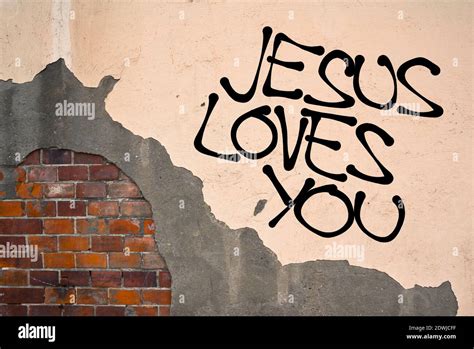 Jesus Loves You Handwritten Graffiti Sprayed On The Wall Anarchist