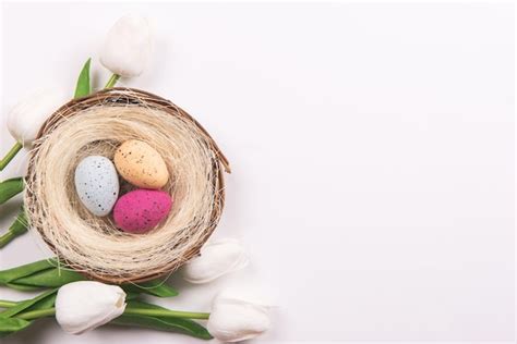 Premium Photo Colorful Decorations With Easter Egg Nest And Tulip