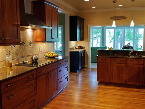 A polyurethane varnish and stain combo can change up the hue and feel of the cabinets as well as protect them. Oak Kitchen Cabinet Refinishing - Home Cabinets Design