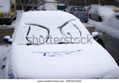 Funny Face On Snow Covered Cars Stock Photo Edit Now 1006654465