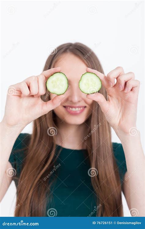 Girl With Cucumber Eyes Stock Image Image Of Holding 76726151