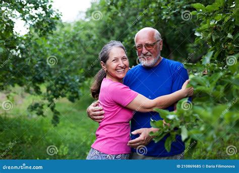 Cute Older Men And Women In Apple Garden Stock Image Image Of Senior
