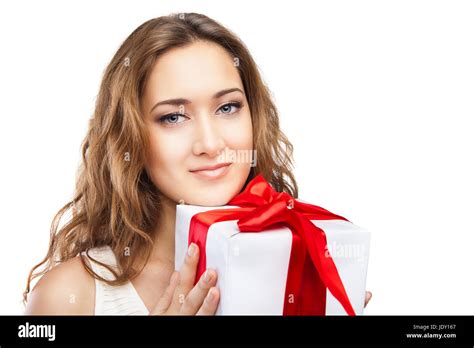 Beautiful Young Christmas Girl With A Present Isolated On White