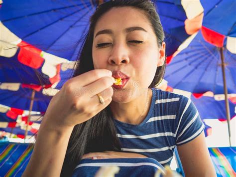 woman eating local grilled seafood of thailand beach stock image image of delicious picnic