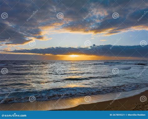 Sunrise Over The Ocean With Clouds And Sunburst Stock Image Image Of