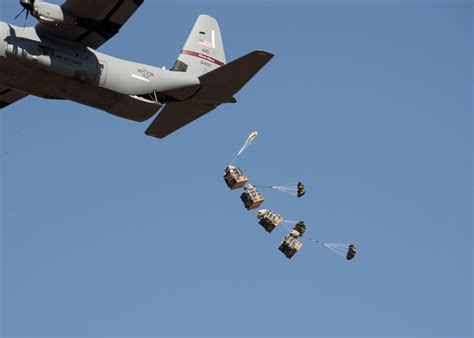 Airborne Testers Conduct Airdrop Tests Of New Container Delivery System