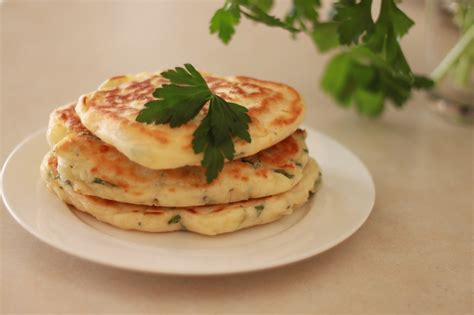 English pikelets are a cross between a drop scone, scotch pancake and a crumpet. Cheese and Herb Pikelets - Recipe - The Healthy Eating Hub