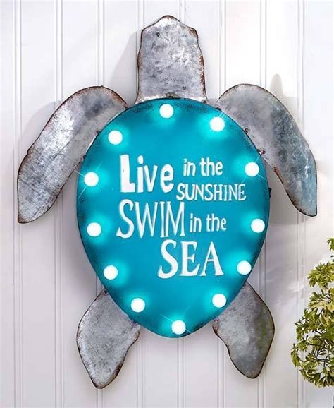 Beach and coastal motifs aren't all just anchors and sails. Lighted Turtle Metal Coastal Wall Sign Sculpture Sea Life ...