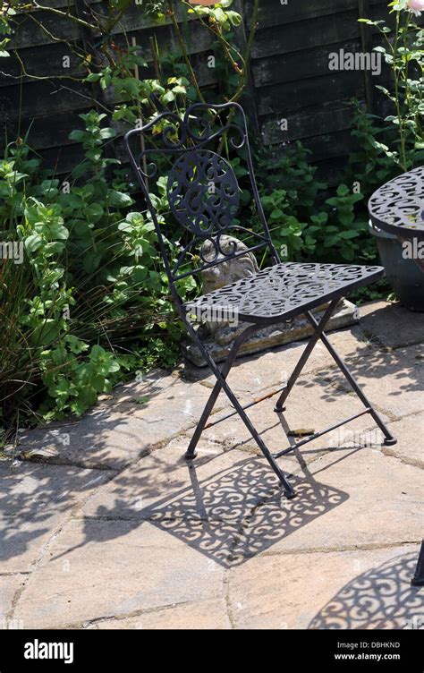 Wrought Iron Garden Chair And Shadow Birmingham West Midlands England