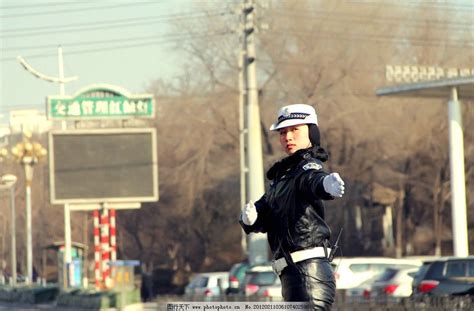 Chinese Policewoman In Full Leather Uniform