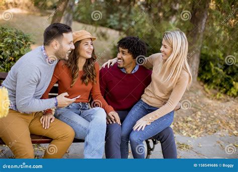 Group Of Young Multiethnic Friends Having Fun At Park Stock Photo
