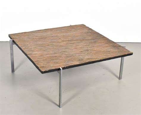 The base is stainless steel in typical kjaerholm design: PK61 coffee table by Poul Kjærholm for E. Kold Christensen ...
