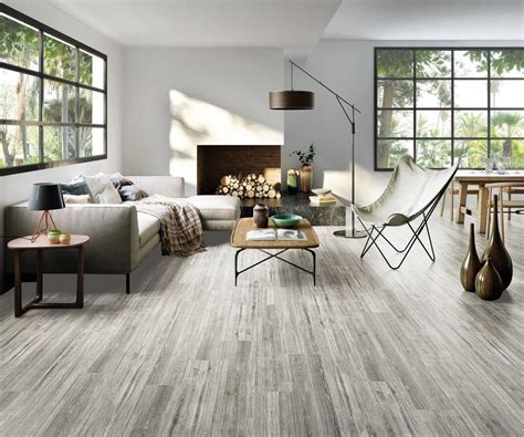 Shop tile and a variety of flooring products online at lowes.com. Ronne Gris Wood Plank Ceramic Tile | Wood planks, Plank ...