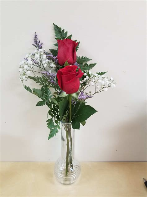 2 Red Roses In A Vase In Levittown Ny Gabrielas Garden Florist
