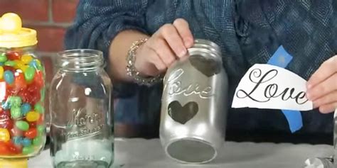 She Puts Hot Glue On A Mason Jar Then Takes Paint To Create This