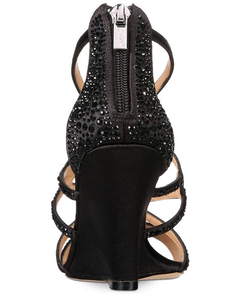 Badgley mischka harks back to the glamourous golden age of hollywood with its 40's style dresses. Badgley Mischka Satin Ally Strappy Evening Wedge Sandals ...