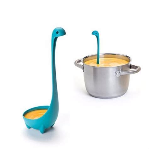 image of a blue plastic ladle designed to look like the loch ness monster. on one side, the ladle sits by itself, and on the other, the ladle sits in a pot of soup, resembling the head of the loch ness monster sticking out of loch ness