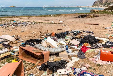 Coastal Degradation With Dirty Beach Rubbish And Domestic Waste