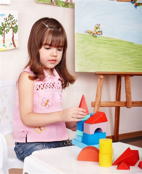 Child With Wood Block In Play Room Stock Image Image Of Education