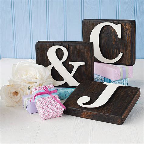 Decorating with letters has become a trend lately and more and more people are showing interest in this matter. reclaimed wooden block letters by möa design | notonthehighstreet.com