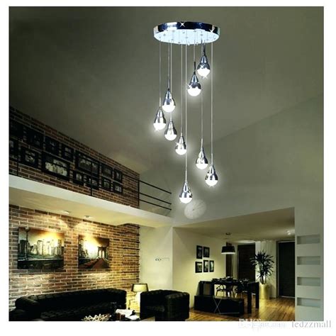 Ceiling fans often come with a mounting flange beneath the fan motor that can accommodate an optional light kit. How To Change Light Fixture On High Ceiling | www ...