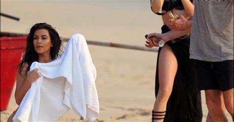 Photos Kim Kardashian Reveals Her Inflated Butt In A Tiny Bikini As She Poses For Beach Shoot