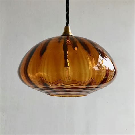 Two Amber Glass Shades Agapanthus Interiors