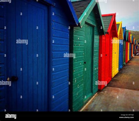 Colorful Beach Huts In Row Stock Photo Alamy