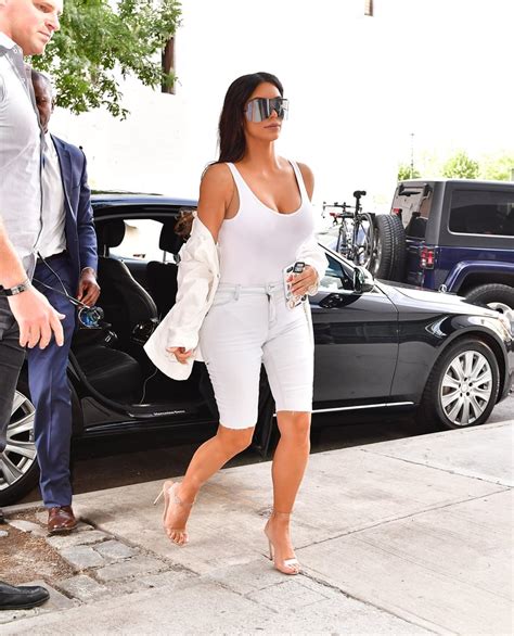 kim kardashian wearing bermuda shorts popsugar fashion