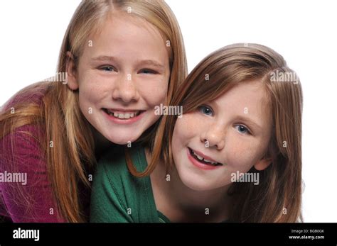 Two Sisters Smiling Isolated On Hi Res Stock Photography And Images Alamy