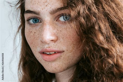 Beautiful Freckles Young Woman Close Up Portrait Attractive Model With Beautiful Blue Eyes And