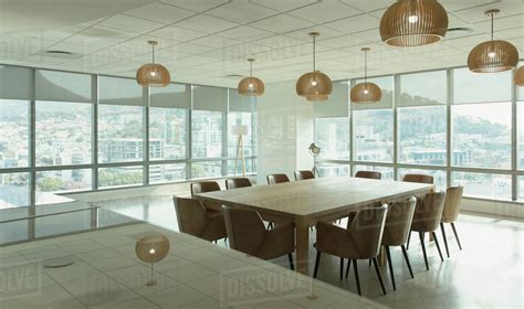Conference Table And Pendant Lights In Modern Office Conference Room
