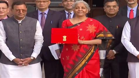 Finance Minister Nirmala Sitharaman Comes With Traditional Temple Border Red Saree To Present