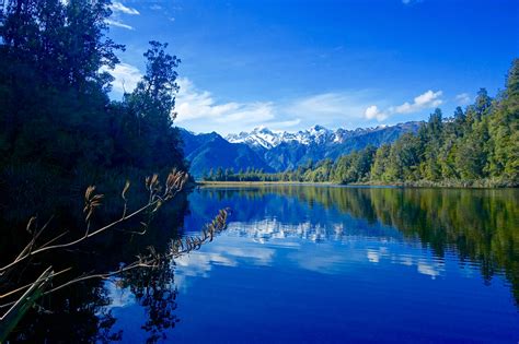Mirror lake, located 56 kilometers north of te anau and next to highway 94, is called mirror lakes in english, and the accurate translation is mirror lakes. Mirror reflection of Mount Cook, Lake Matheson, New ...