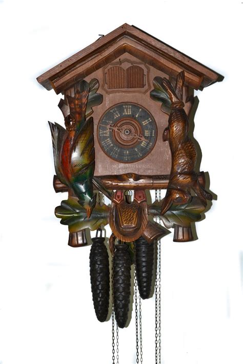 Vintage Hunting Lodge Cuckoo Clock Having Carved Pheasant An
