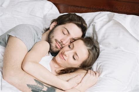 Romantic Couple Lying In Bed Hugging Stock Photo Dissolve Hot Sex Picture