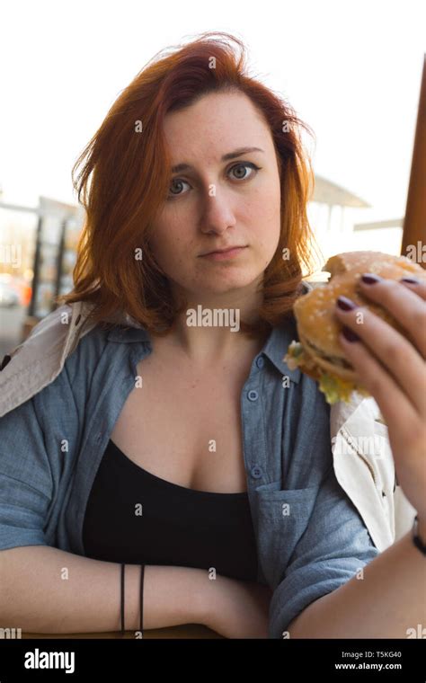 Hamburger Close Up Young Woman Eating In Fast Food Restaurant Cheeseburger Medium Fries And