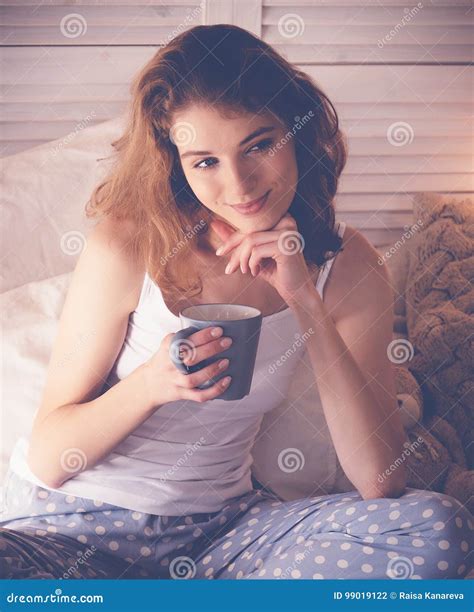 Beautiful Woman Drinking A Coffee In Her Bed Lifestyle Concept Stock
